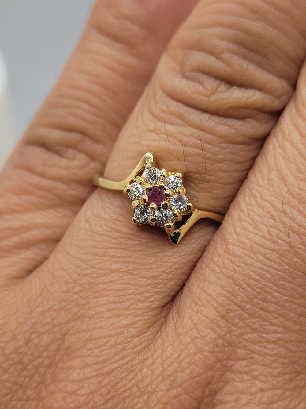 Gold-Tone Floral Cluster Ring with Ruby Center